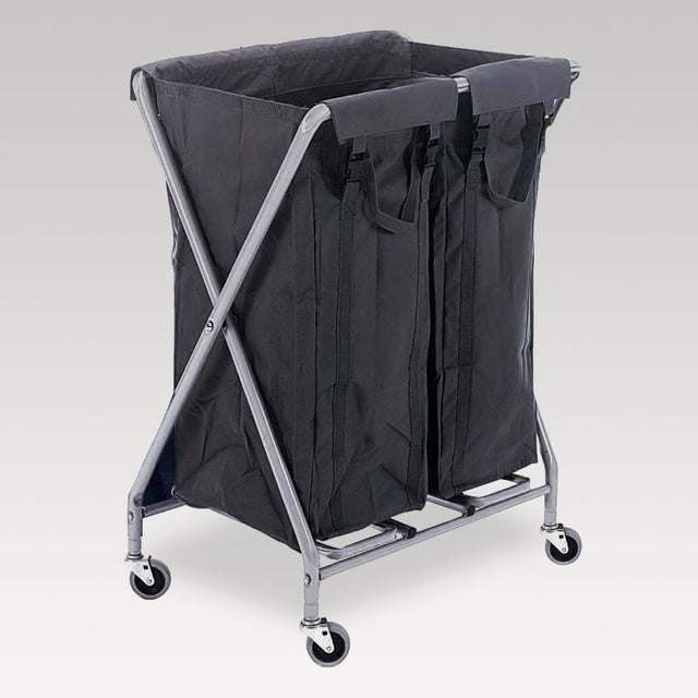 Alt text: "Numatic Servo-X Trolley with two 100L bags, foldable design, drag handles, and castor wheels for easy laundry transport."