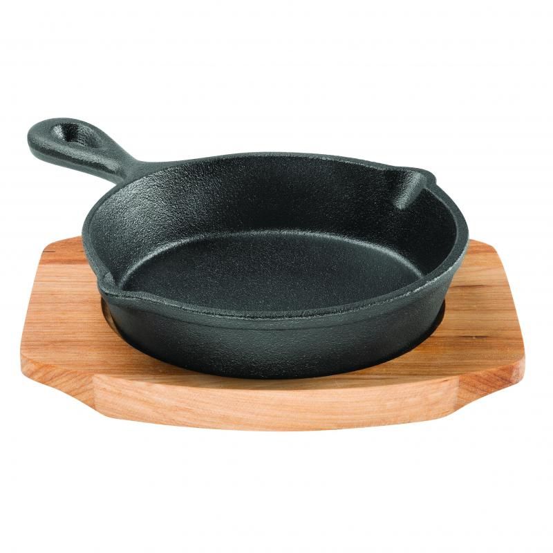 Pre-seasoned cast iron skillet with elegant maple tray, ideal for cooking and serving on all stovetops and outdoors.