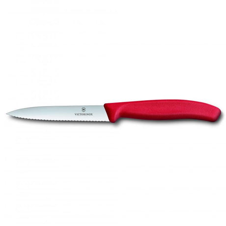 Red Victorinox paring knife with a 10 cm wavy edge, ideal for precise cutting and comfortable handling in the kitchen.