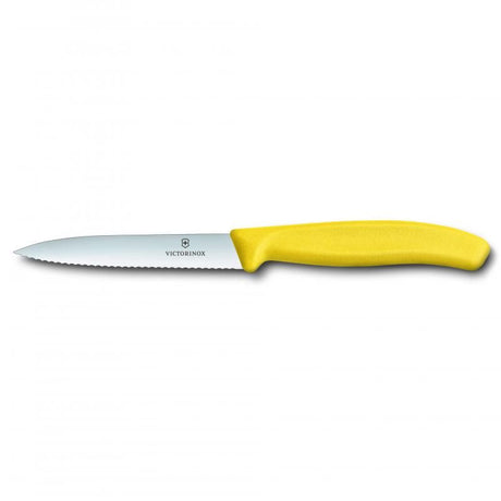 Victorinox 10 cm paring knife with wavy edge and vibrant yellow handle, ideal for slicing and peeling fruits and vegetables.