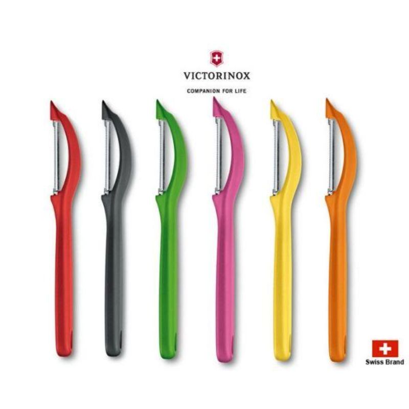 Red Victorinox Universal Peeler with serrated double edge, designed for effortless peeling of fruits and vegetables.