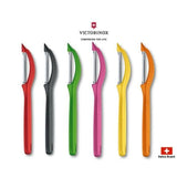 Red Victorinox Universal Peeler with serrated double edge, designed for effortless peeling of fruits and vegetables.