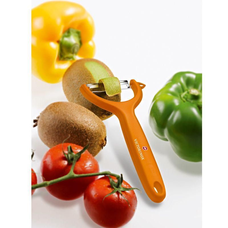 Micro-serrated orange peeler designed for effortlessly peeling tomatoes and kiwis, featuring an ergonomic handle for comfort.