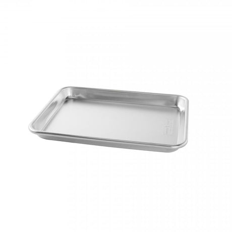 Natural aluminum quarter sheet pan for baking brownies, cookies, and reheating meals; features even heat distribution and lightweight design.