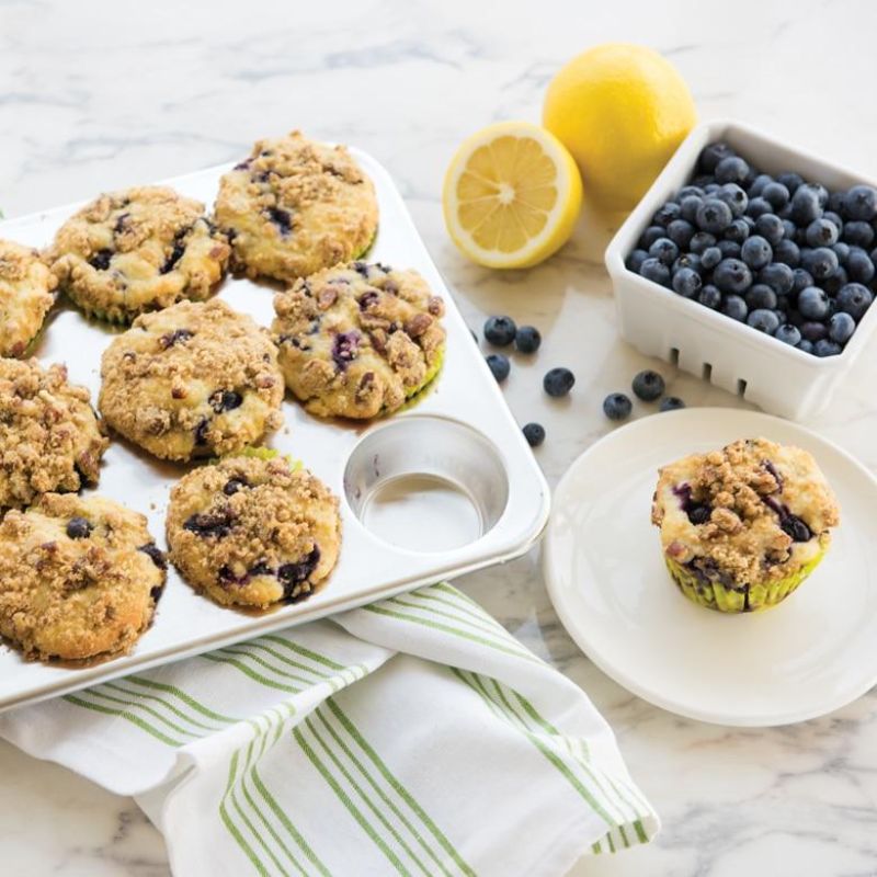 Nordic Ware Naturals® Muffin Pan featuring 12 aluminum cups for even baking, durable design, and easy maintenance.