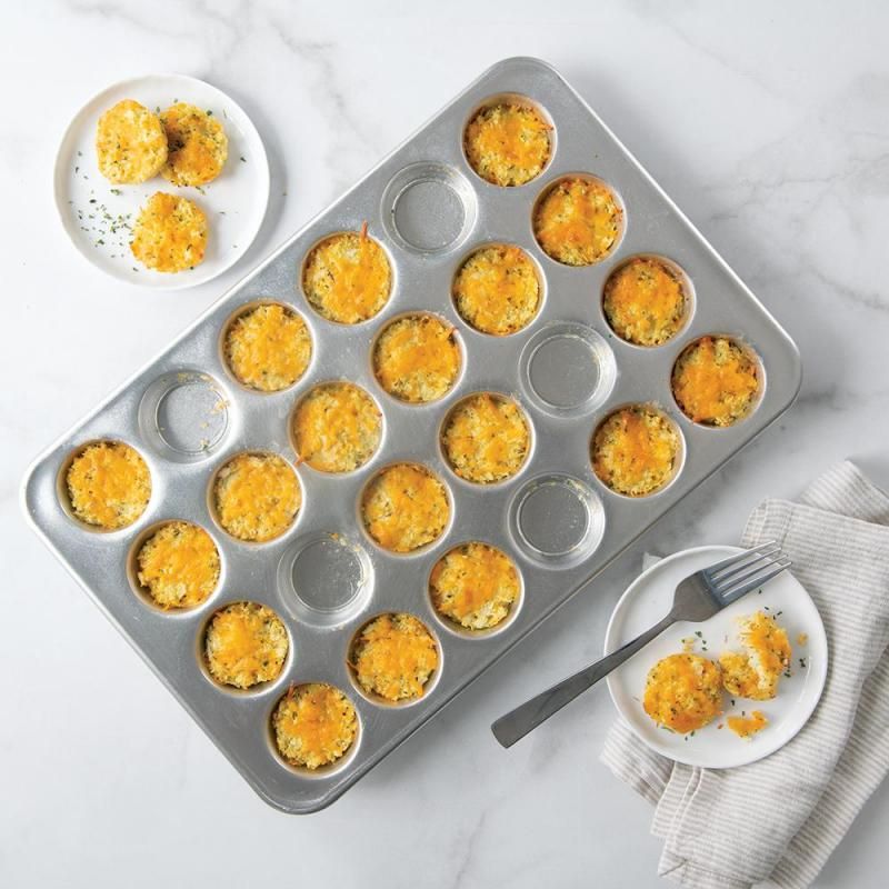 Nordic Ware Naturals® Petite Muffin Pan, 24-cup, natural aluminum for even baking of miniature muffins and treats.