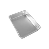 Nordic Ware Naturals® 9"x13" rectangular cake pan, made of durable aluminum for even baking and easy handling.