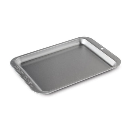 Compact aluminum baking sheet, 6.3x8.4 inches, for small-batch cooking in toaster or countertop ovens, made in the USA.