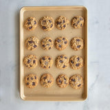 Nordic Ware Nonstick Big Sheet Baking Pan for even baking of cookies, bars, and cakes; boasts a durable nonstick surface.