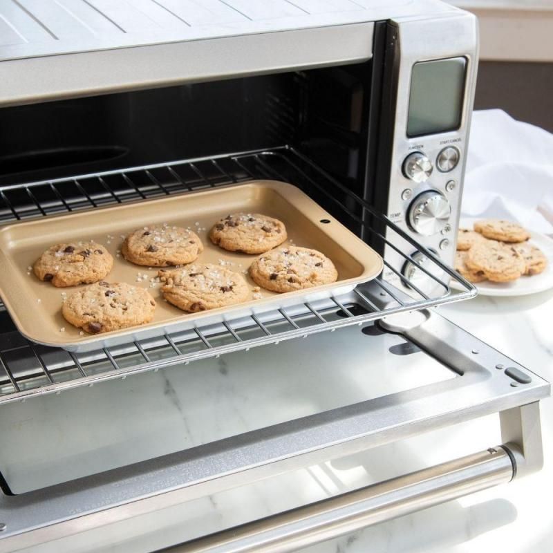 Nordic Ware Nonstick Compact Baking Sheet, lightweight aluminum design for effortless baking and easy cleanup.