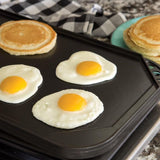 Nordic Ware Two-Burner Griddle, reversible for cooking pancakes, eggs, and meats; durable cast aluminum with even heat distribution.