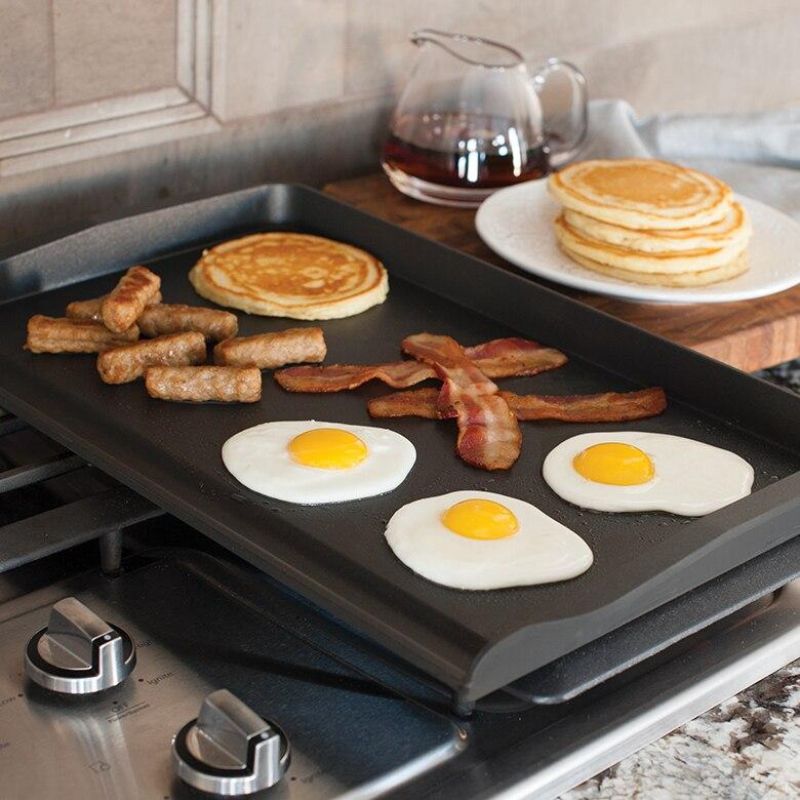 Nordic Ware Double Backsplash Griddle: Durable cast aluminum, nonstick, large cooking surface, ideal for stovetops and mess-free cooking.