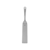 Long spatula by Anne Sophie Pic, made of durable stainless steel, designed for precision in cooking and elegant food presentation.