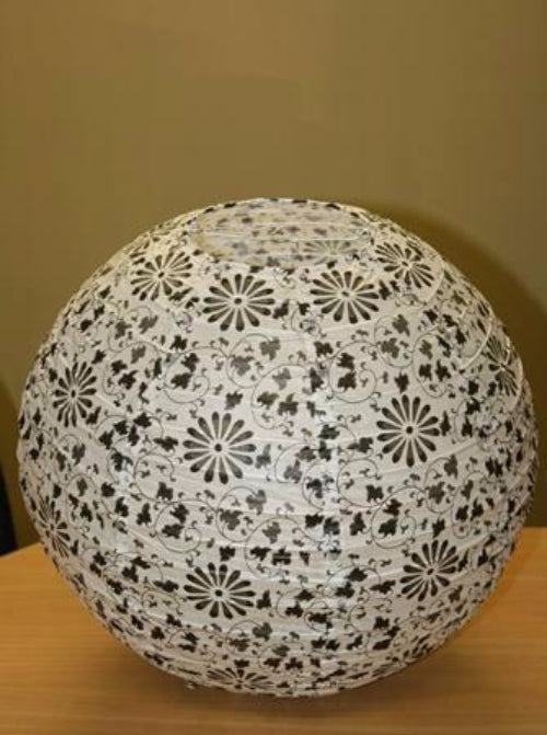 Five 16'' white floral paper lanterns with bamboo ribbing for elegant decor at events, featuring easy light bulb clips.