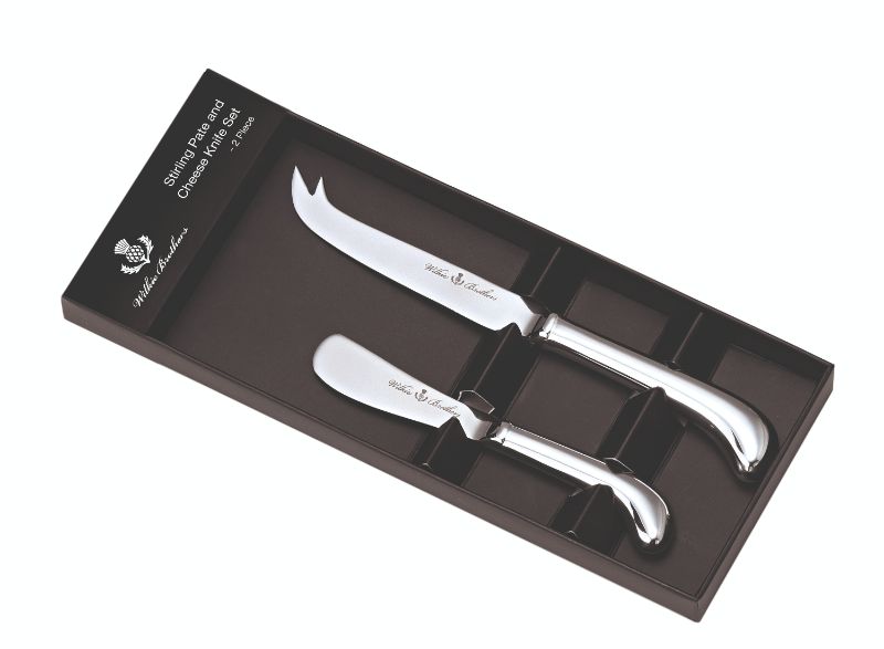 Wilkie Pistol 2 Piece Cheese Set featuring stainless steel knife and spreader with artistic Pistol handles, ideal for cheese lovers.