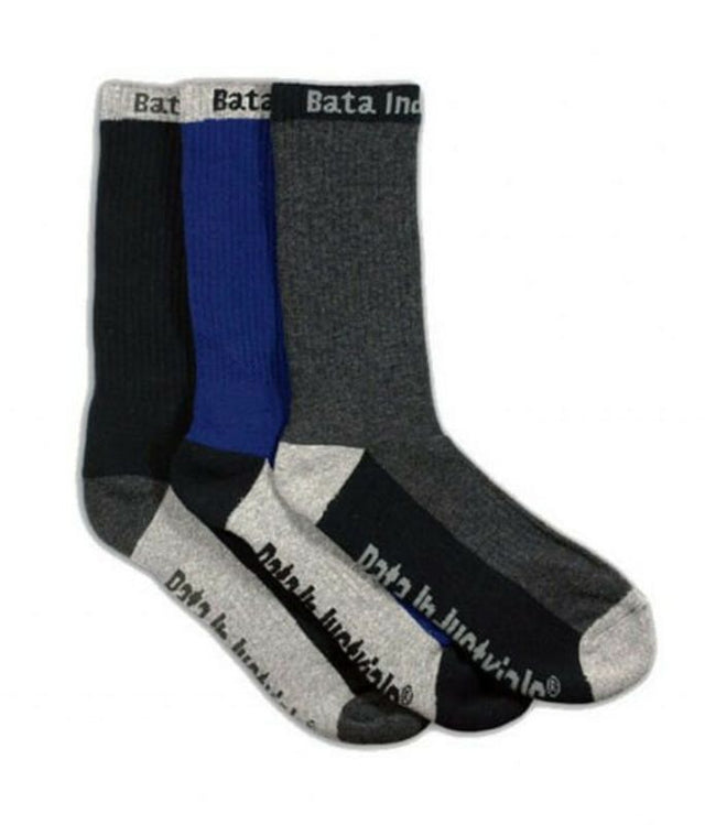 Three-pack of comfortable work socks in black, navy, and grey, featuring cushioned footbed and arch support for all-day wear.