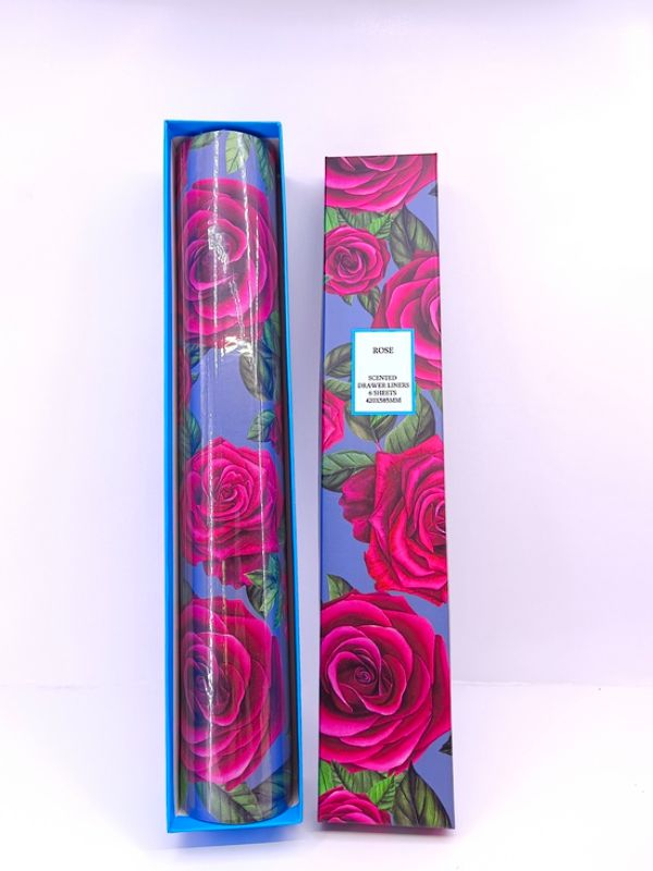 Elegant rose-patterned drawer liners, 6 sheets 42cm x 58cm, protect surfaces while adding a fresh scent and style.