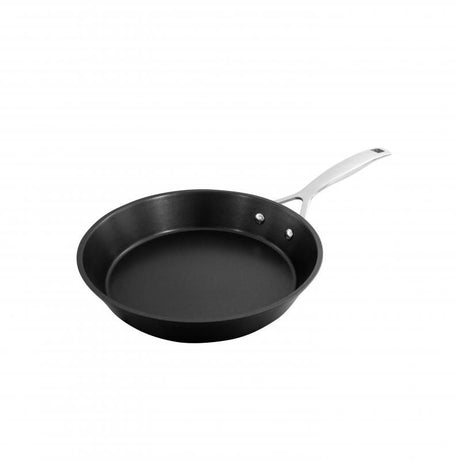 Pyrolux Ignite Skillet 26cm with non-stick coating, stainless steel handles, and tempered glass lid for versatile cooking.