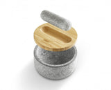 Elegant Joseph Joseph Dash Pestle & Mortar in granite with reversible bamboo lid for grinding herbs and prepping ingredients.