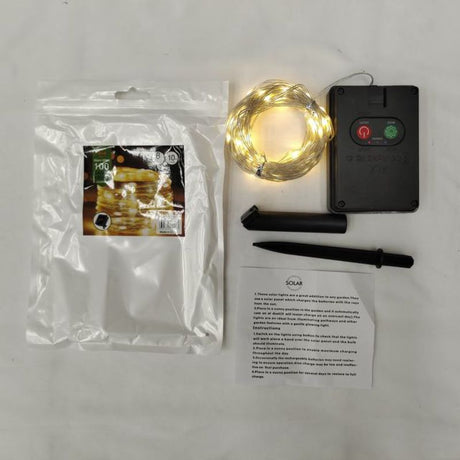 Solar-powered Christmas lights set of 6 with 100 warm white LEDs, perfect for festive decorations indoors and outdoors.