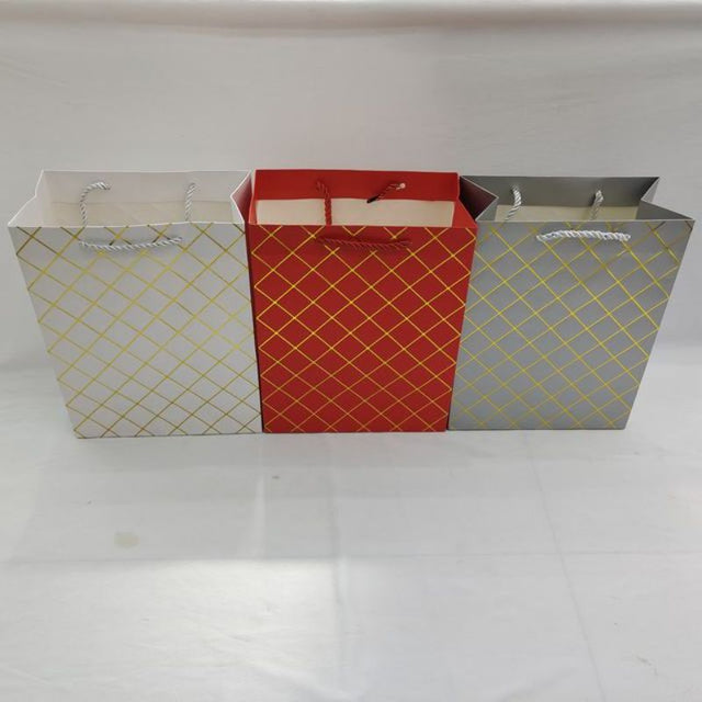 Vibrant assorted gift bags (31x41x12cm) in a pack of 12, perfect for any occasion and designed with eye-catching colors.