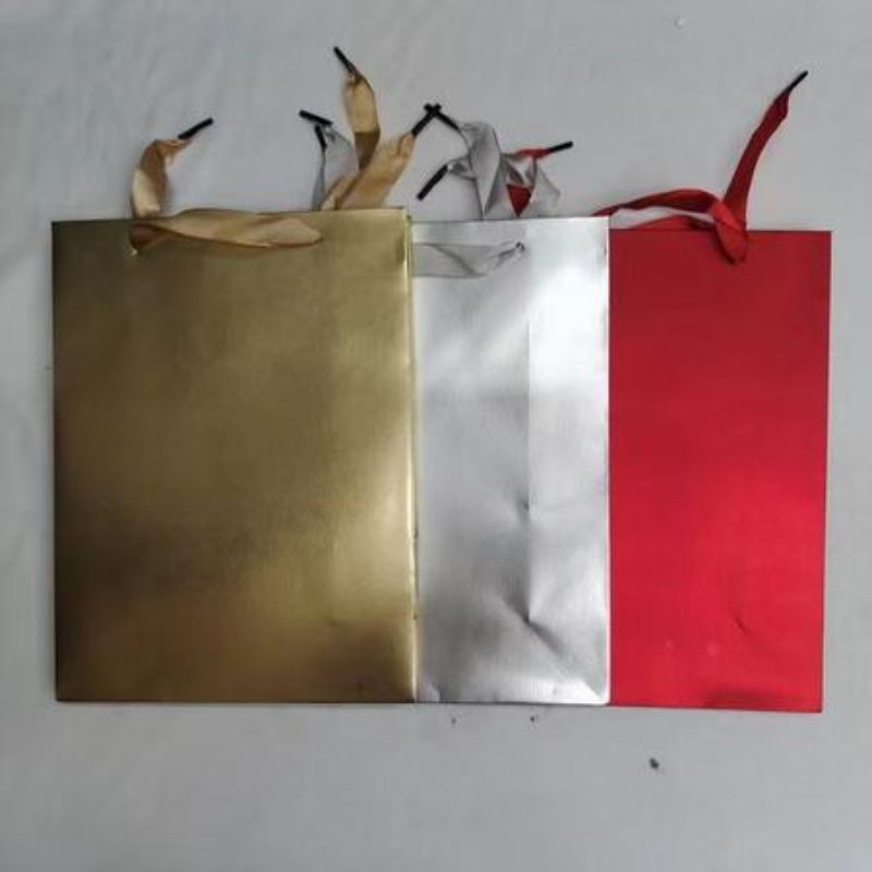 Colorful pack of 12 eco-friendly gift bags, measuring 32 x 26 x 10CM, ideal for all occasions and stylish gift wrapping.