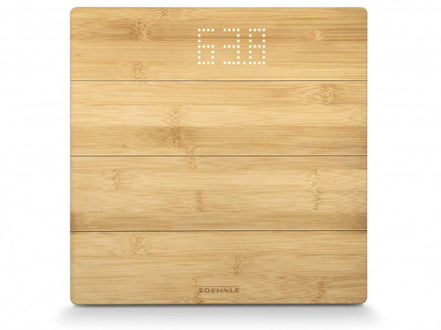 Digital bathroom scales with bamboo surface, LED display, 180kg capacity, and stylish design for home wellness.