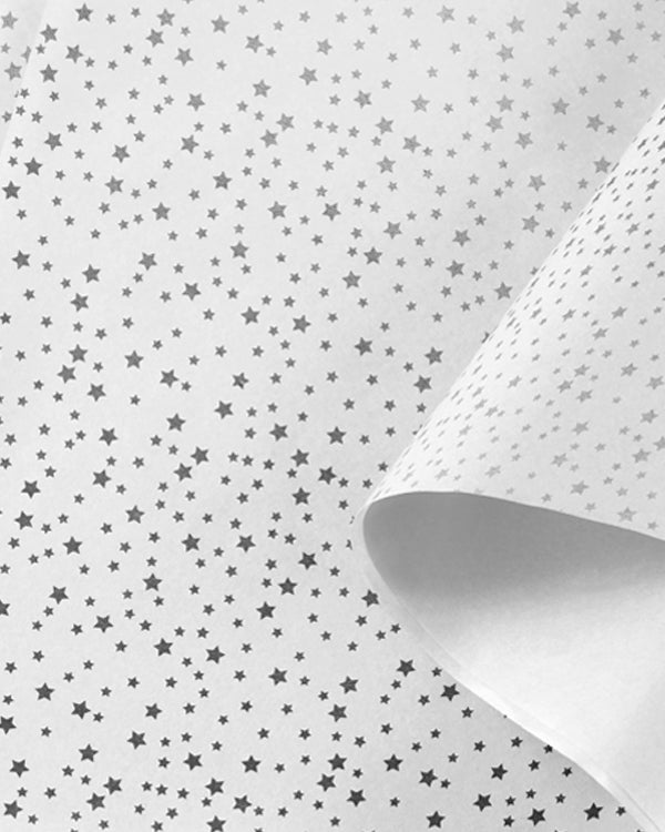 Silver star-patterned tissue paper, 200 sheets, perfect for elegant gift wrapping and crafting, made from sustainable materials.