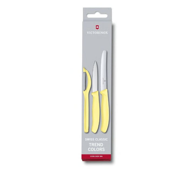Vibrant yellow 3-piece paring knife set with ergonomic handles, includes paring, tomato knives, and universal peeler.