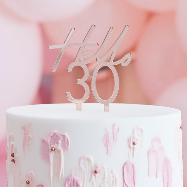 Rose gold 'Hello 30' cake topper, 13cm tall, adds elegance and fun to your 30th birthday celebrations.