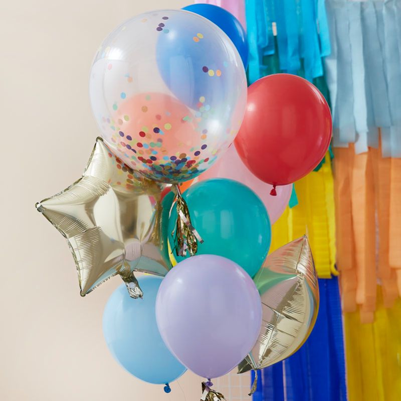 Colorful balloon bouquet with star foil and confetti balloons, perfect for vibrant celebrations and festive occasions.