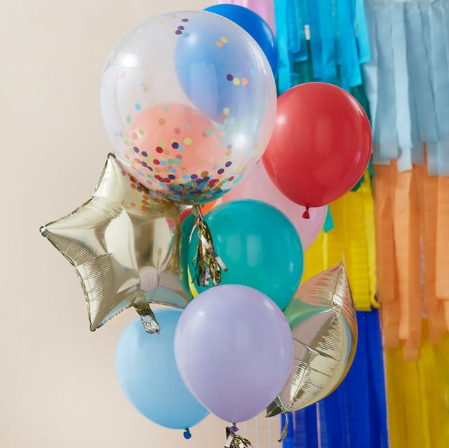 Colorful balloon bouquet with star foil and confetti balloons, perfect for vibrant celebrations and festive occasions.