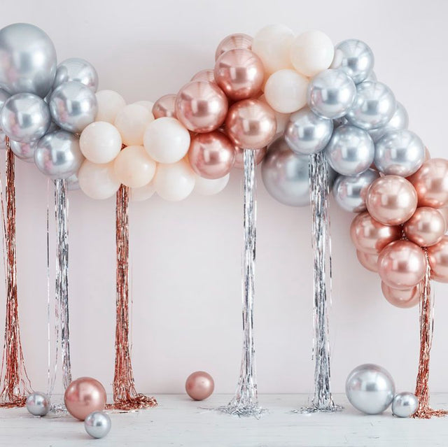 Mixed metallic balloon arch kit with streamers, featuring 95 balloons for an impressive party centerpiece or entrance.