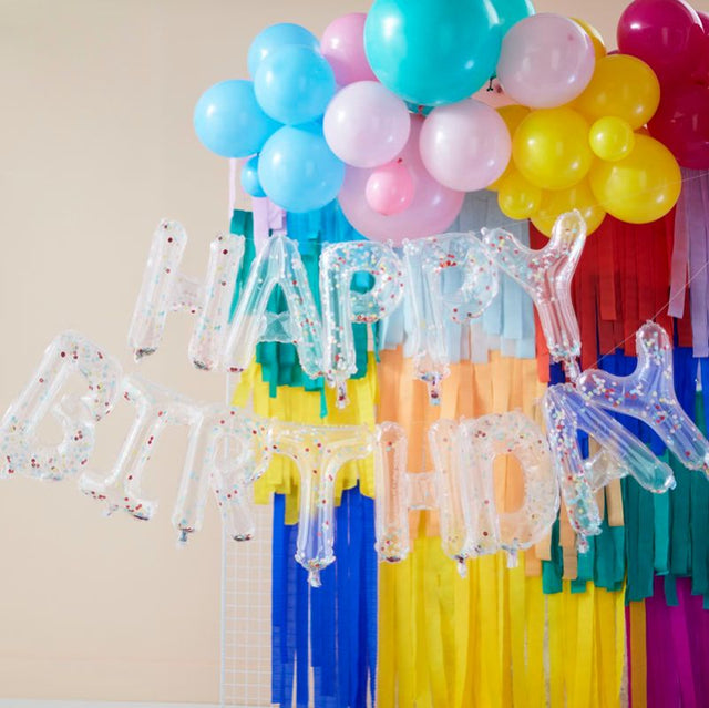 Vibrant rainbow confetti balloon bunting spelling “Happy Birthday,” perfect for festive celebrations without helium.