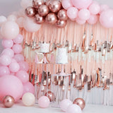 Pink and rose gold balloon arch kit featuring 200 balloons, perfect for elegant parties and memorable photo opportunities.