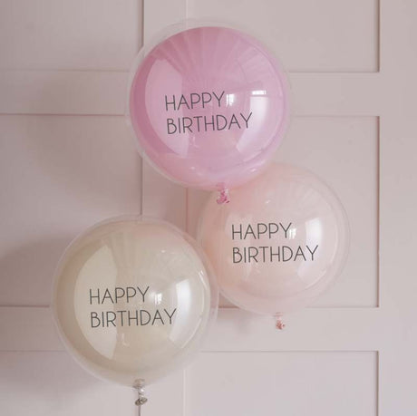 Elegant pink double-layered balloons with pastel shades for birthday celebrations, eco-friendly packaging included.