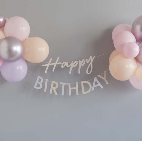 Pastel pink birthday bunting with assorted balloons, perfect for festive celebrations and eco-friendly decor.