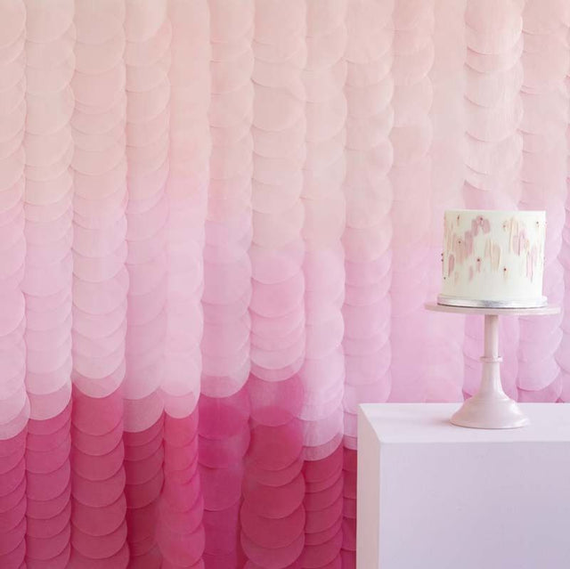 Blush pink ombre tissue paper disc backdrop, perfect for events, with 18 strands, 200cm x 200cm, made from recyclable materials.