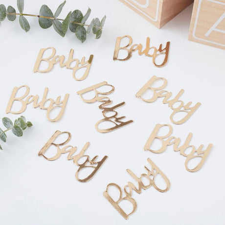 Gold baby shower confetti spelling 'Baby' in elegant script, perfect for adding sparkle to your celebration decor.