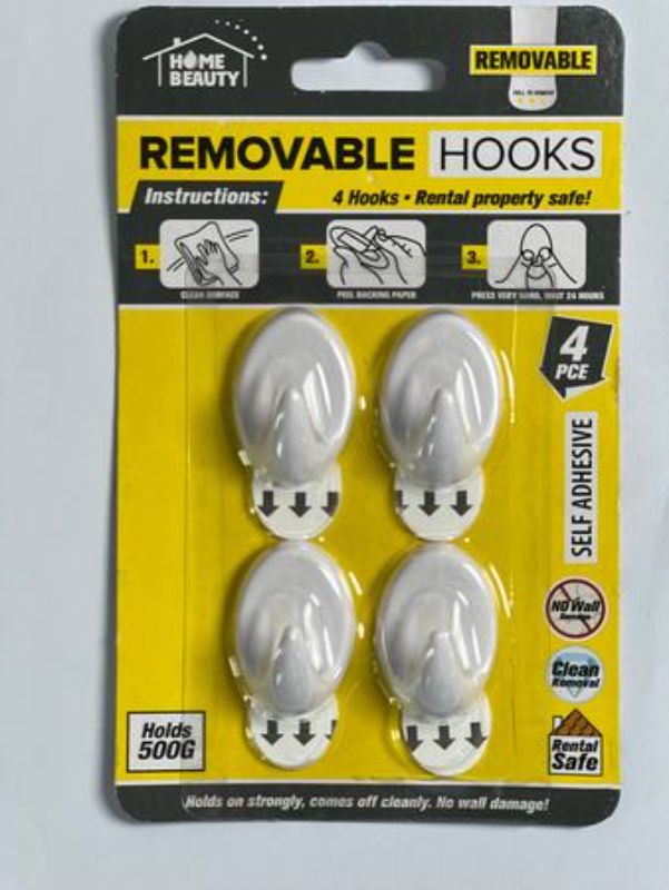 Self-adhesive hooks holding 500g, 3.5cm high, perfect for easy and damage-free hanging in any space.