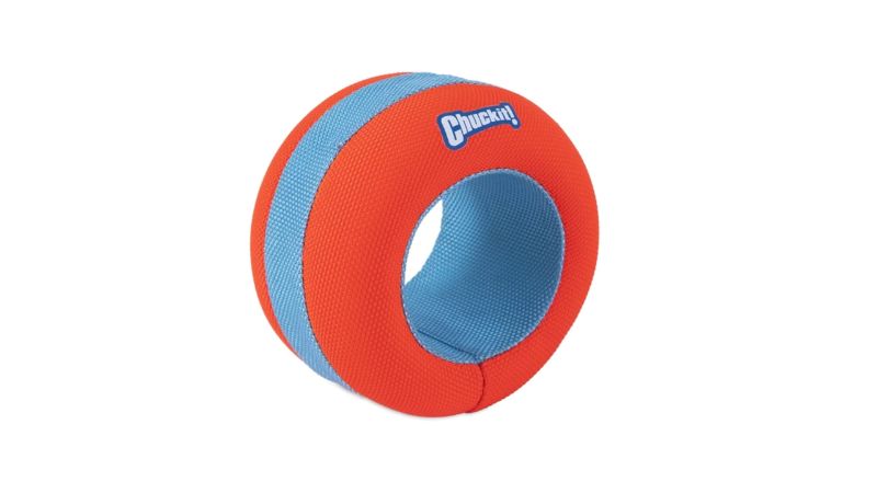 Bright orange Chuckit Amphibious Roller dog toy, designed to float and withstand water play for energetic pups.