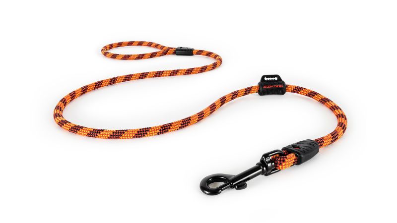 Durable orange dog leash made from climbing rope, 120cm long, with reflective strands and a waste bag holder for safety.