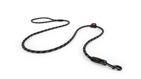 Lightweight black dog leash made from climbing rope with reflective strands, 120cm long, soft grip, and waste bag holder.