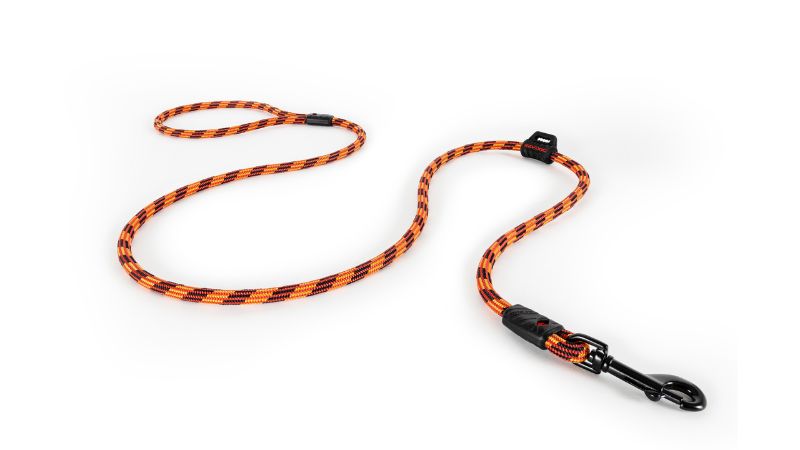 Lightweight 120cm dog leash in LITE Orange, made from durable climbing rope, with reflective strands and snap clip for safety.