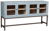 Kitchen console in sea-salt old pine, featuring four doors, metal handles, and rustic elegance perfect for any decor style.