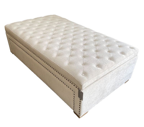 Cream oversized ottoman measuring 1.4m, featuring a chic blanket box design with linen upholstery and timber frame.