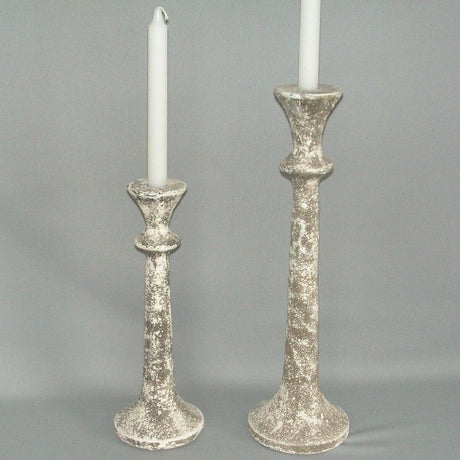 Vivid green taper candlestick (40cm) perfect for elegant decor and creating a warm atmosphere for any occasion.