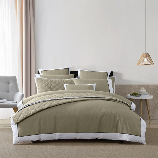 Single bed quilt cover set featuring olive herringbone pattern, white border, and black piping for a modern, elegant touch.