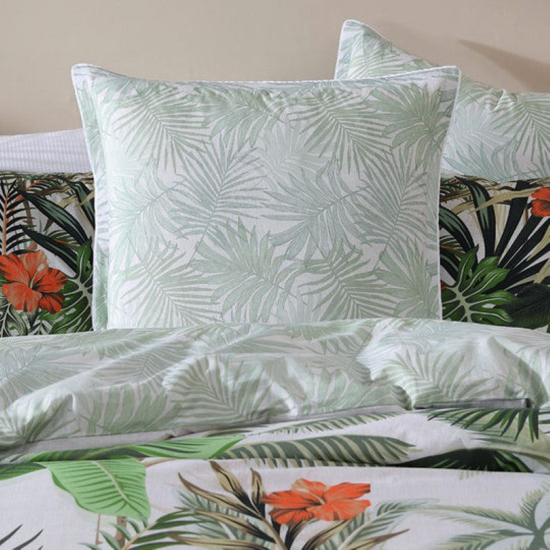 Logan & Mason Lanai Palm European Pillowcase featuring palm leaf design, white piping, and 100% cotton percale fabric.