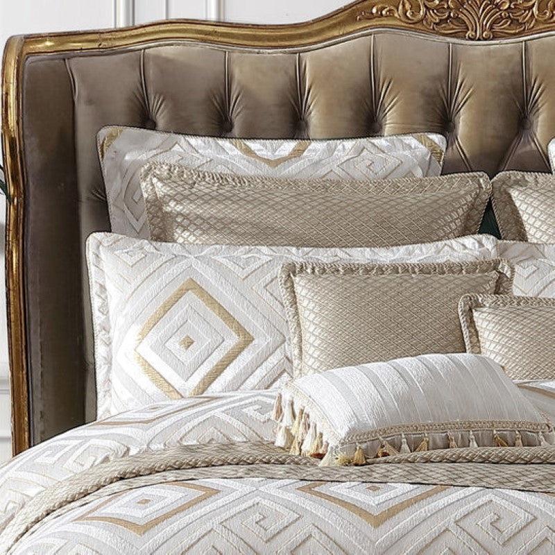 Luxurious gold on ivory quilt cover set with textured chenille and Greek key motif, includes Super King cover and pillowcases.